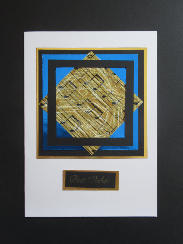 Handmade birthday card. 
Gold and blue musical