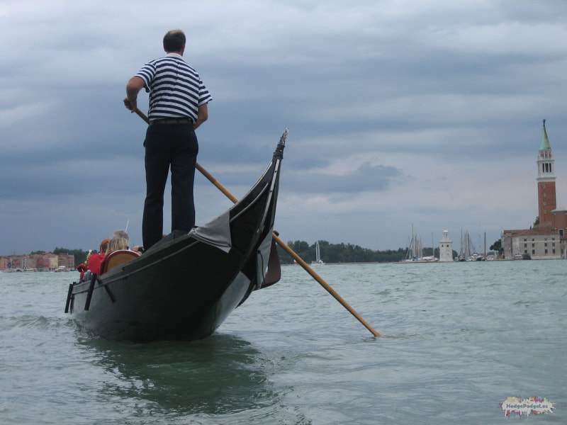Gondolier  in action in Venice. 