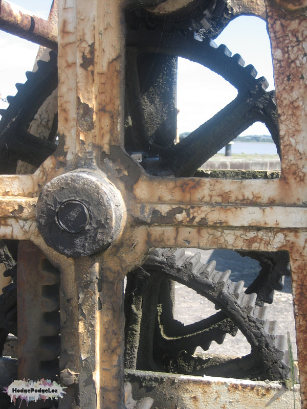 Photograph of rusty cogs taken in Lydney Harbour, England. 