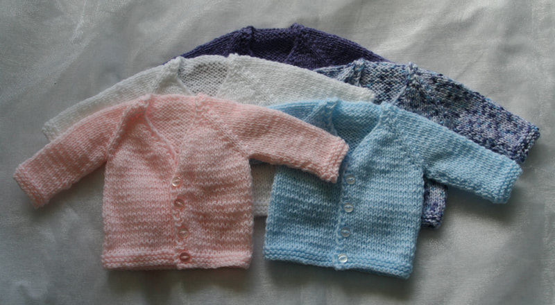 Premature baby v neck cardigans in pink blue and white. Available in my Etsy store