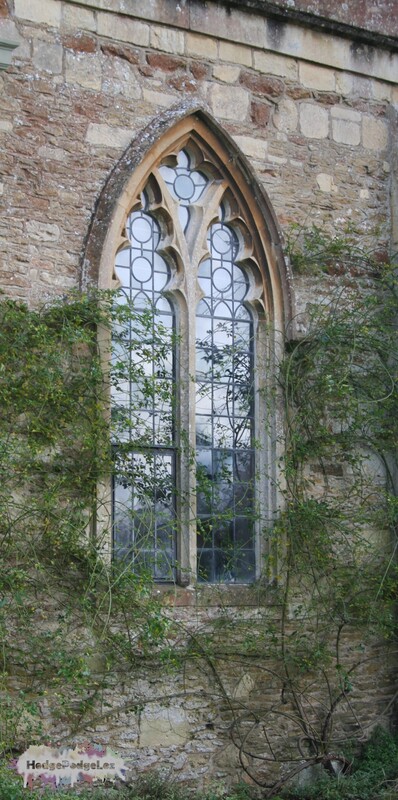 Stained glass window in a stone wall