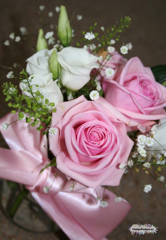 Photograph of pink and white wedding posy with roses