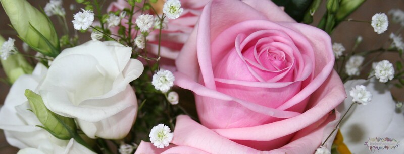 Photograph of pink and white wedding posy with roses