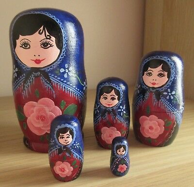 Photograph of set of 5 Russian Dolls decorated in a traditional style
